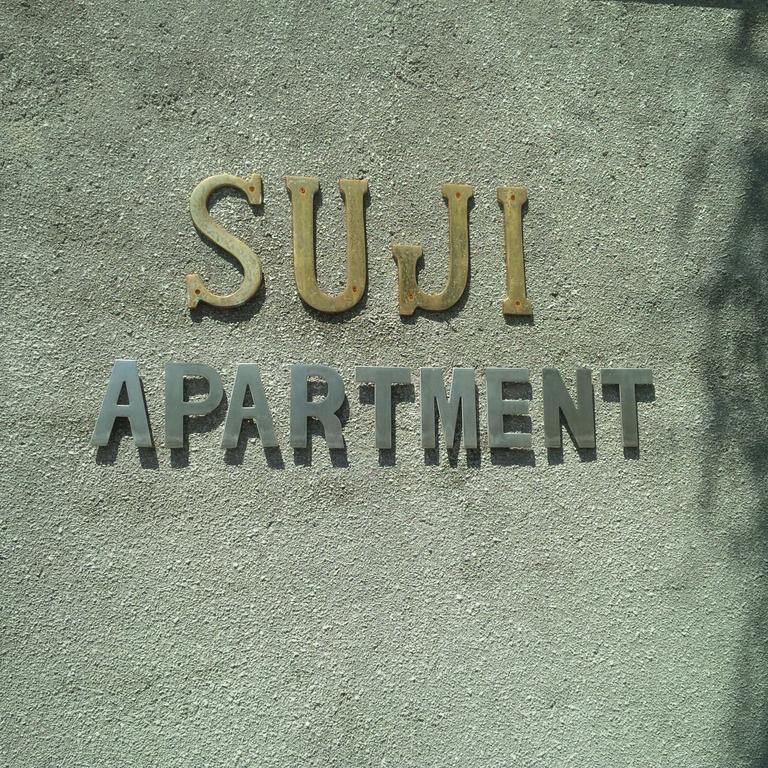 Suji Apartment Bali Kamer foto