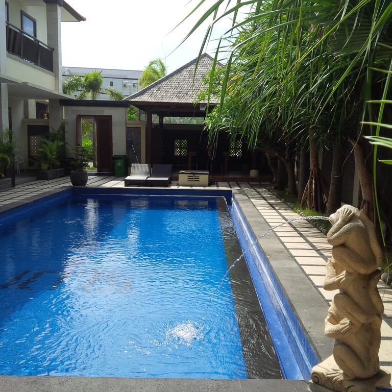 Suji Apartment Bali Kamer foto