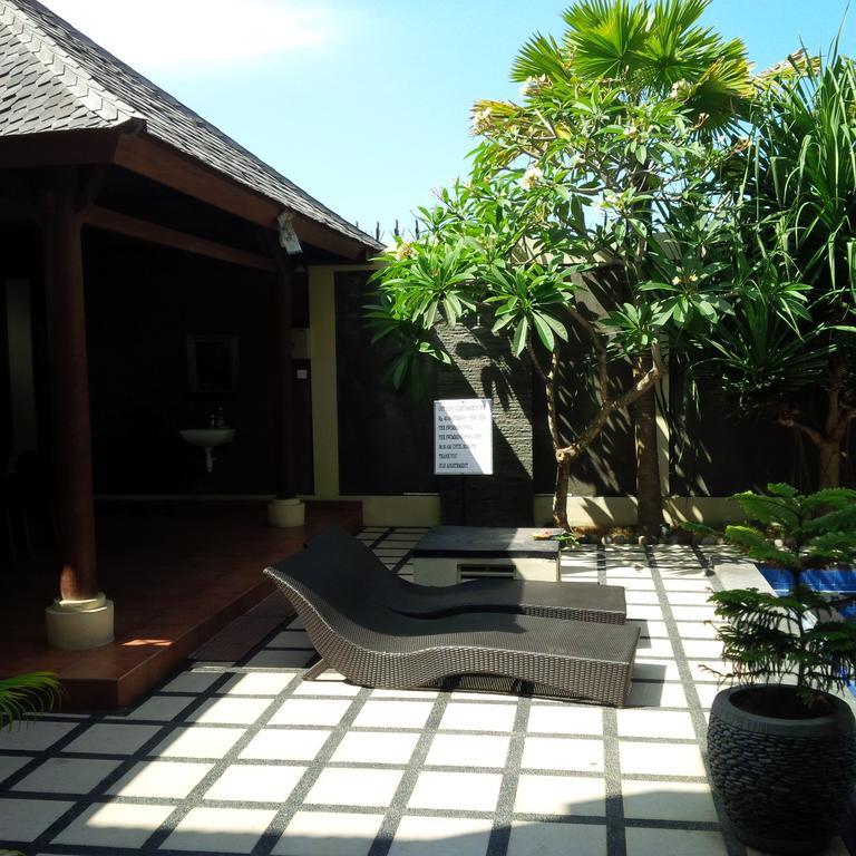 Suji Apartment Bali Kamer foto