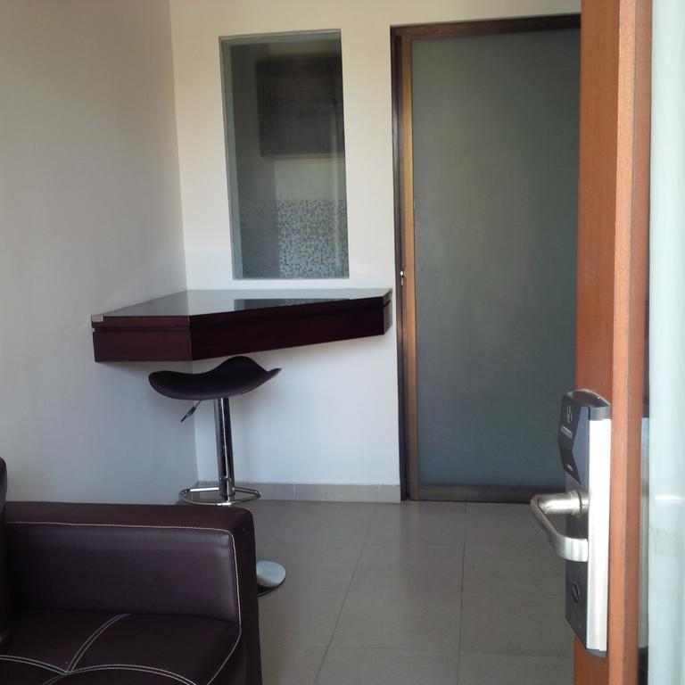 Suji Apartment Bali Kamer foto